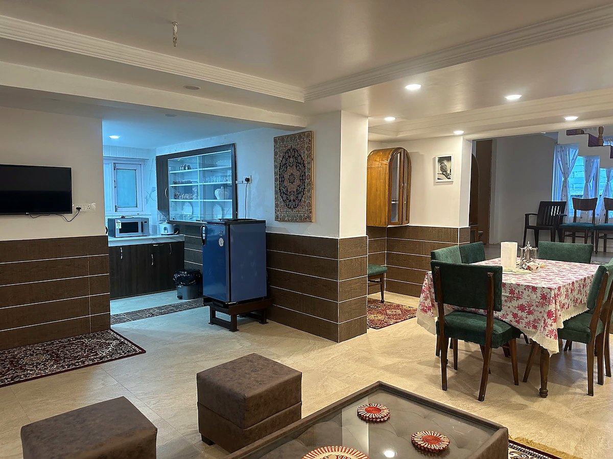Kitchen and dining area viewed from the living room couch